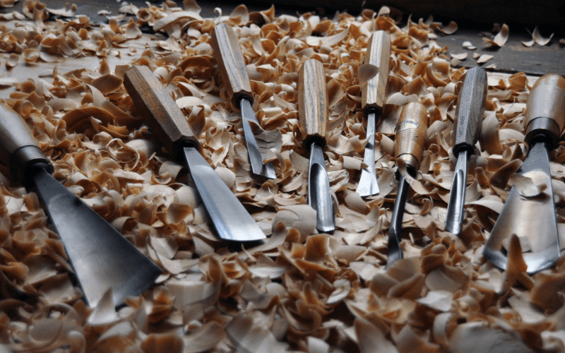 Different wood carving chisels after carving